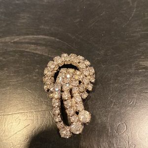 Sparkly brooch faux rhinestones.